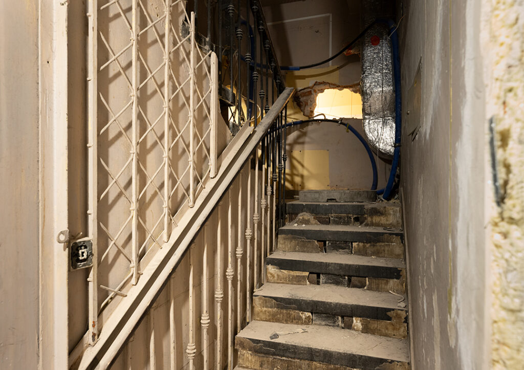 Staircase of the Pod Kruki townhouse during renovation.